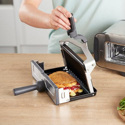 Grille-pain 3 en 1 Ninja Foodi, gril électrique avec couvercle, presse à panini avec design rabattable, 7 fonctions de cuisson, 7 lignes de pain grillé, plaque de cuisson et plateau ramasse-miettes, acier inoxydable, ST202EU