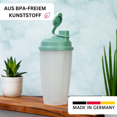 Westmark Mix-und Schüttelbecher/Dressingshaker mit Messskala, herausnehmbarer Mixscheibe und verschließbarem Ausgießer, Fassungsvermögen:0,5l,Kunststoff, BPA-frei,Farbe:Transluzent/Mint-Grün, 2435227M